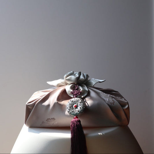 Reusable Korean bojagi gift wrap made with high-quality fabric. Inspired by traditional Korean wrapping cloth, it offers a sustainable, elegant, and heartfelt way to present meaningful gifts for all occasions.